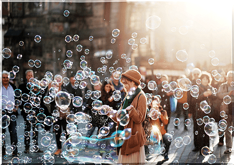 woman popping bubbles