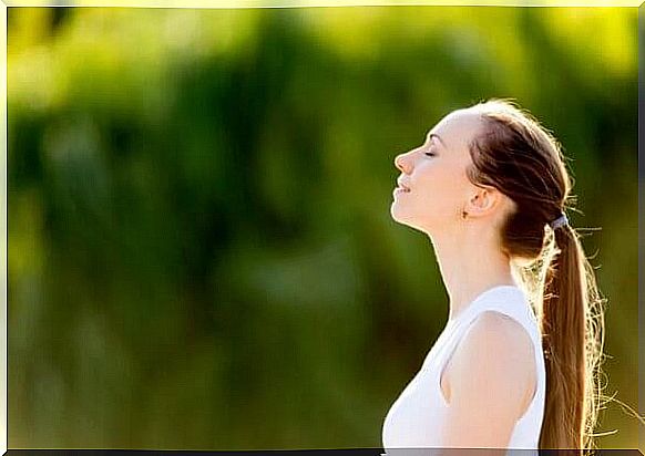 Woman doing deep breathing