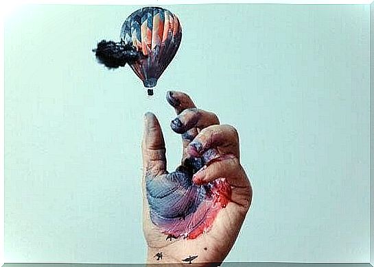 hand and balloon