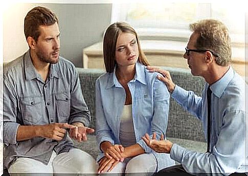 A couple talking to a psychologist.