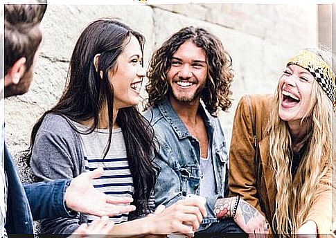 Group of friends laughing.