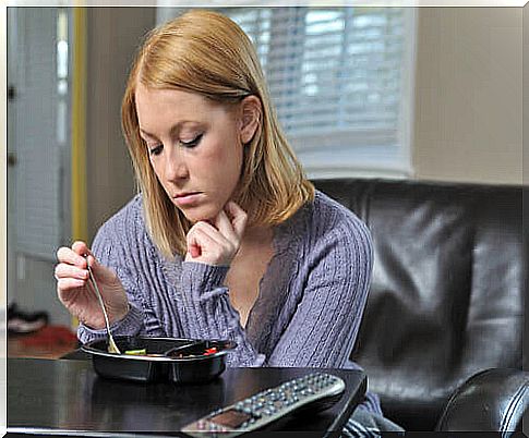 Girl with depression eating.