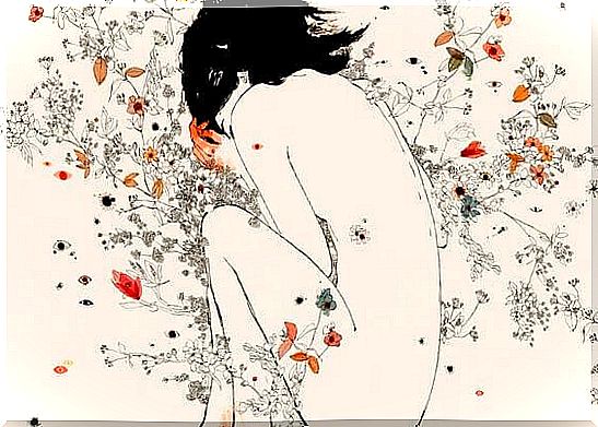 naked woman lying in flowers