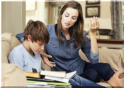 Children study with the help of their mother