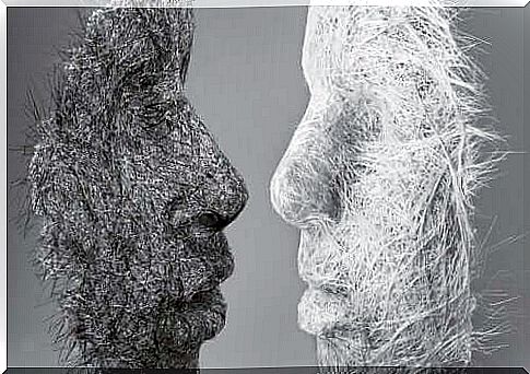 An image of a black mask and white mask facing each other that symbolizes the idea that we can change our personality.