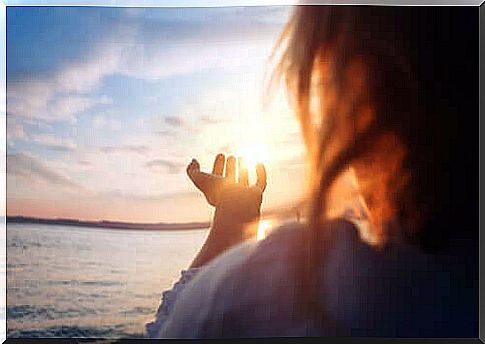 Woman by the sea.