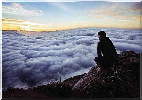 man looking at sea