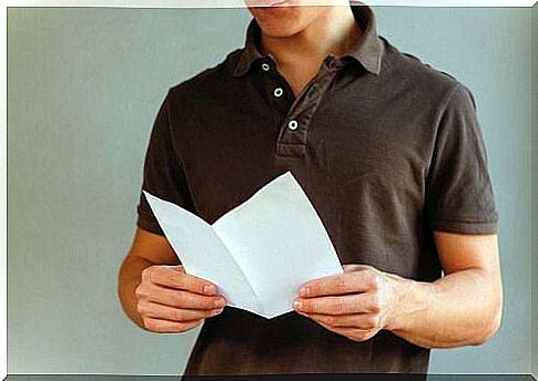 boy reading paper