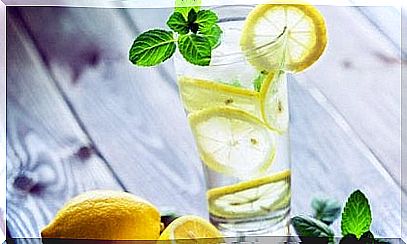 Why should you drink a glass of warm water with lemon in the morning?